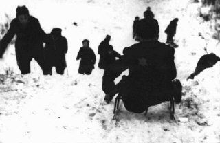 Jewish children sledding in the Kovno ghetto. Kovno, Lithuania, December 1943